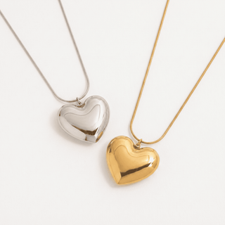 Amara Puffy Heart Pendant Necklace in silver, on a white background, chain detail