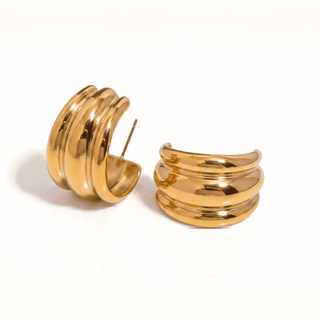 Mira Ribbed Dome Hoop Earrings in gold, on a white background, front view