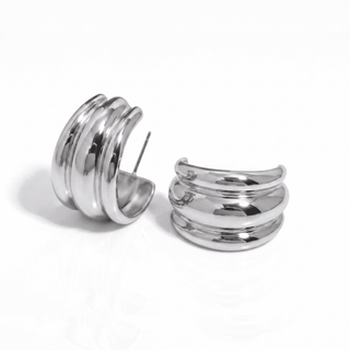Mira Ribbed Dome Hoop Earrings in silver, on a white background, front view