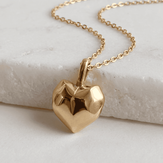 Perrie Faceted Heart Pendant Necklace on a white background, front view