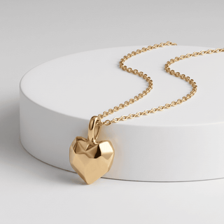 Perrie Faceted Heart Pendant Necklace on a white background, pendant detail