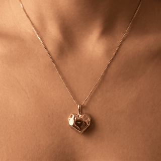 Perrie Faceted Heart Pendant Necklace on a white background, chain and clasp detail