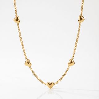Romy Heart Station Necklace on a white background, front view