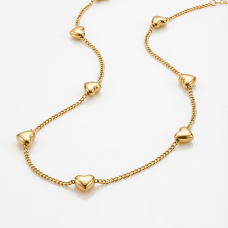 Romy Heart Station Necklace on a white background, clasp detail