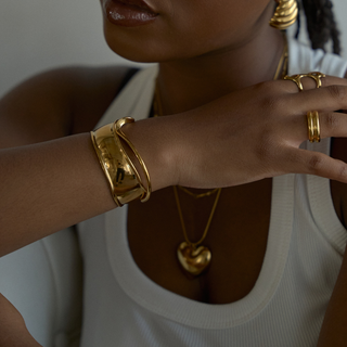 Mara Molten Cuff Bracelet worn on model, close-up on wrist detail