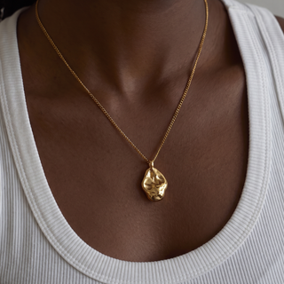 Wren Organic Drop Pendant Necklace worn on model, close-up on pendant